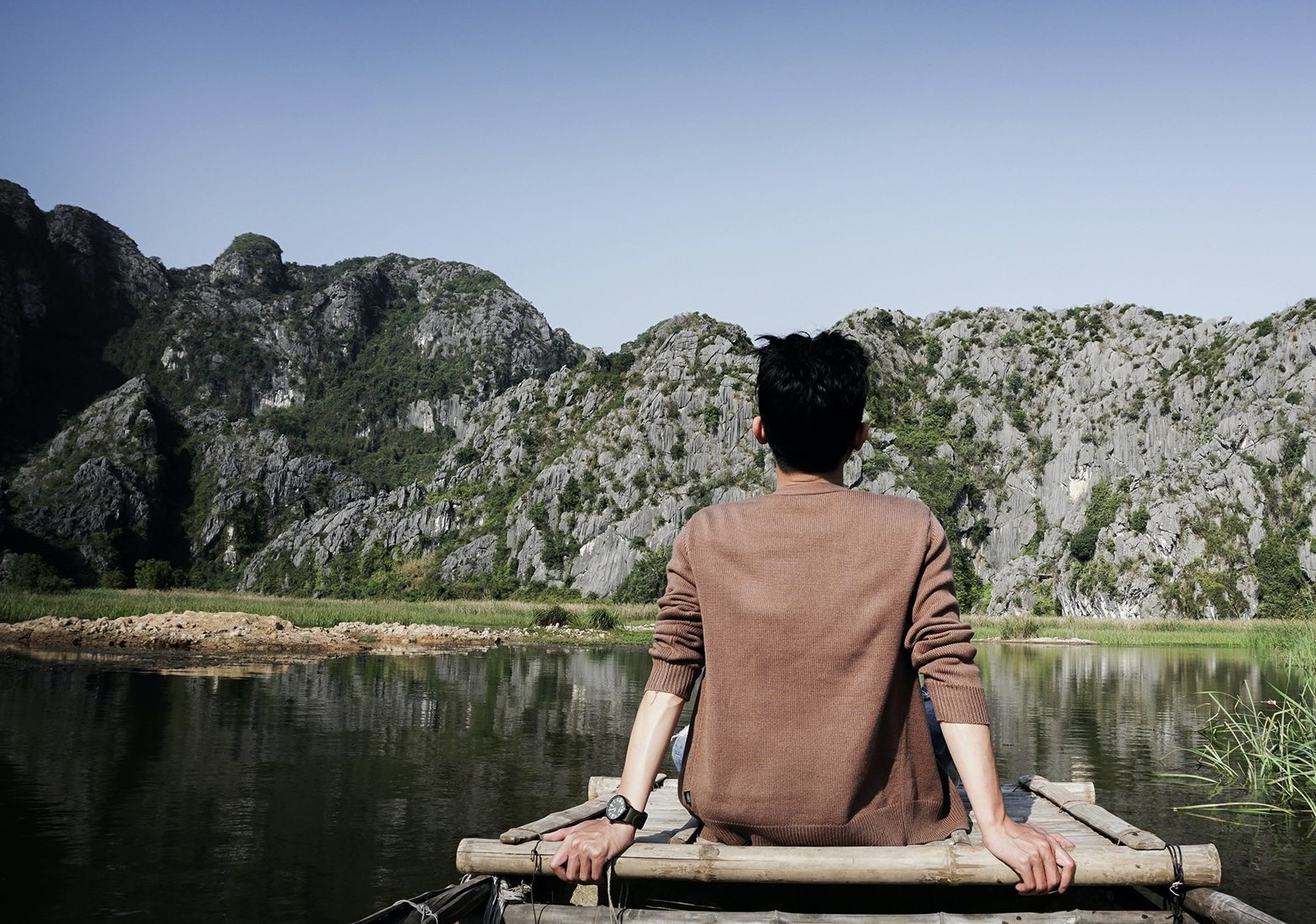 Sit amet lorem ut. Man sitting and looking far away.